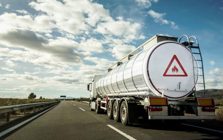 Large tanker truck transporting hazardous materials on the highway