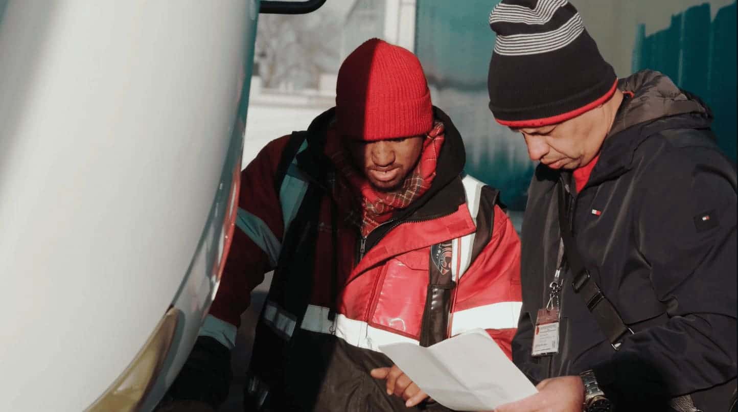 CDL instructor helping student