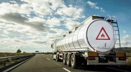 Large tanker truck transporting hazardous materials on the highway